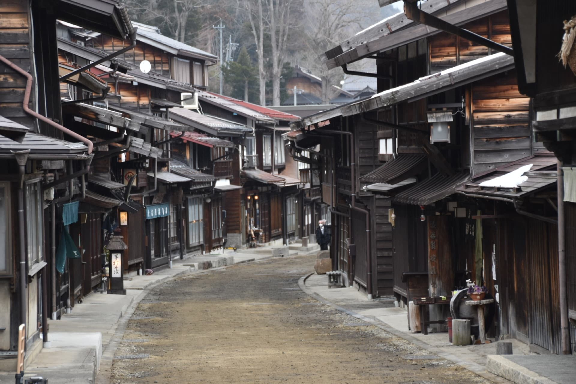 Walking a wooden street alone in the morning